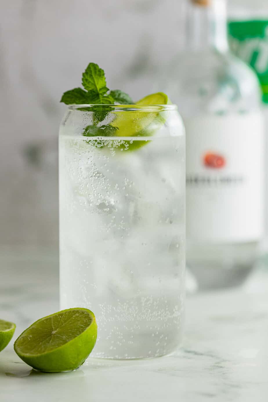 Easy two ingredient gin and sprite drink with fresh lime and mint.